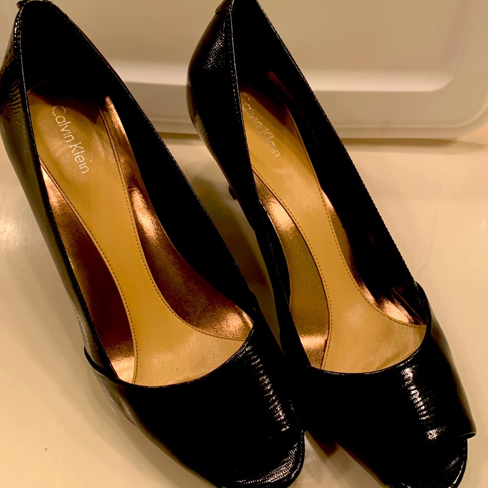 Black peep toe heels.